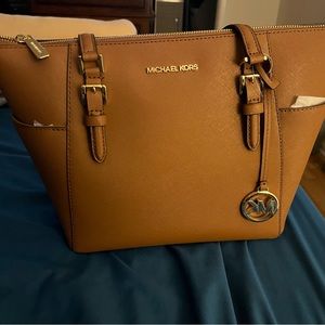Michael Kors Charlotte brown leather tote brand new never used.